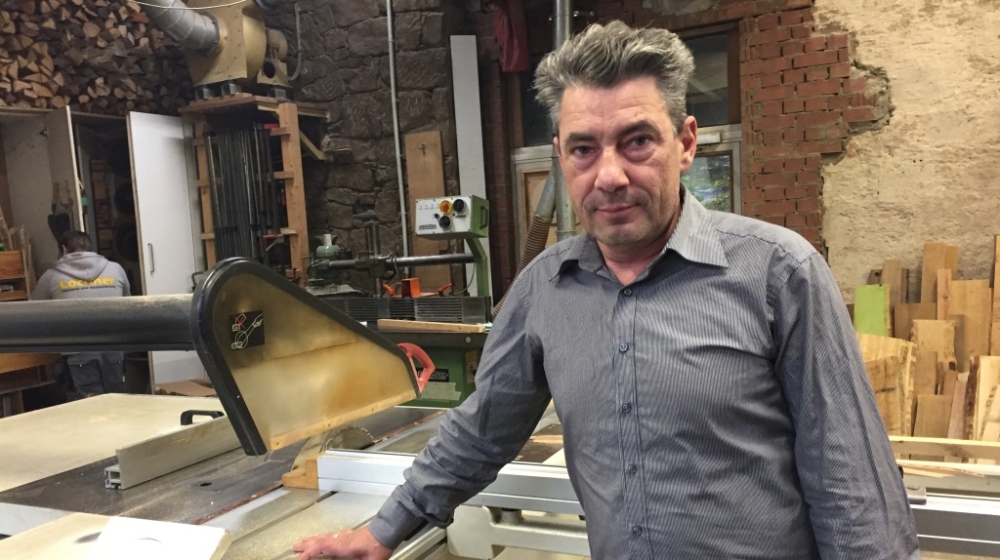 Tim Lochner, once a member of the CDU, now says he is considering voting for the AfD [Sumi Somaskanda/Al Jazeera]