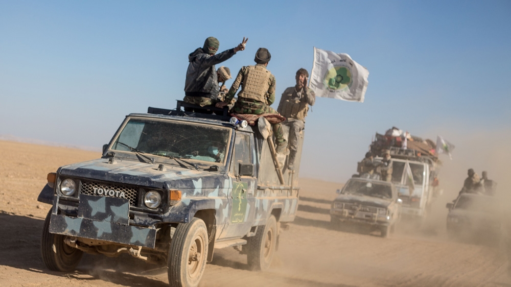 A commander and Badr member nicknamed Abu Ali al-Nasri said the PMU had taken the airport in just six hours, catching ISIL off-guard and killing 15 of its fighters [John Beck/AlJazeera]