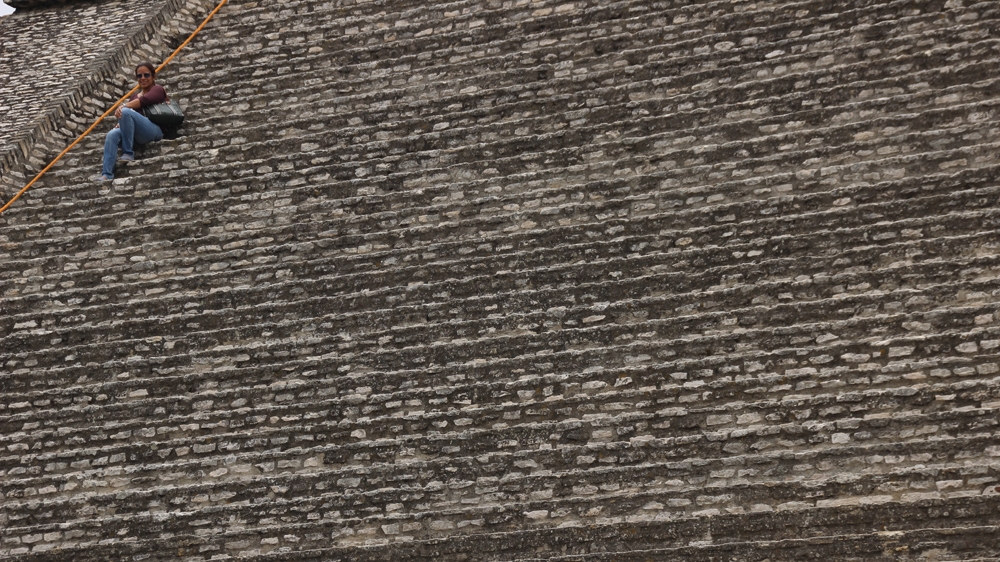 An exposed section of the largest pyramid in the world, the Great Pyramid of Cholula  [Ryan Mallett-Outtrim/Al Jazeera]  