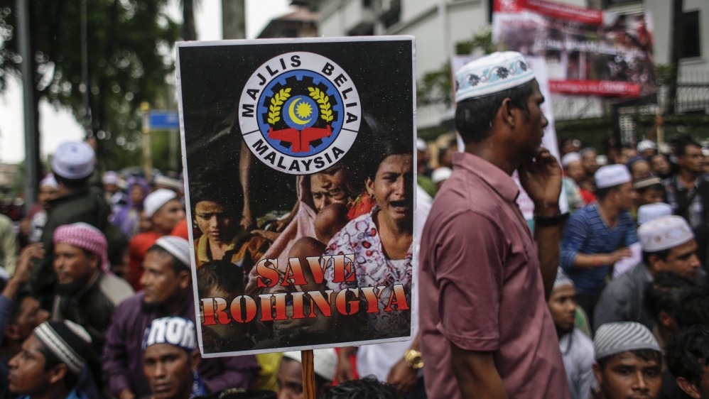 Malaysian activists and Myanmar ethnic Rohingya Muslims protest in front of the Myanmar Embassy in Kuala Lumpur