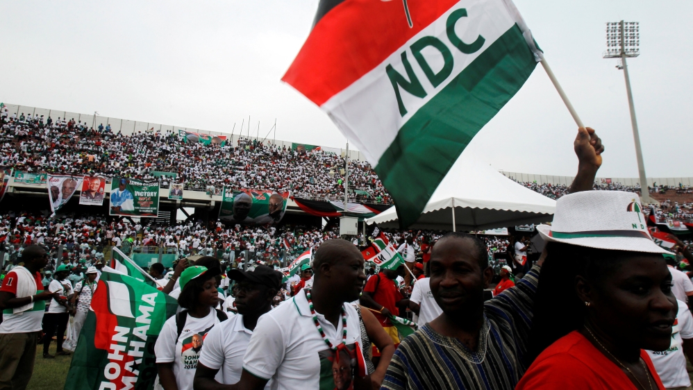 Supporters of John Dramani Mahama, Ghana''s president and National Democratic Congress (NDC) presidential candidate celabrate as they attend his rally at Accra sport stadium