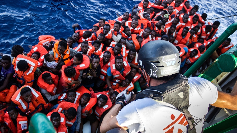  MSF field coordinator   Michele Telaro explains procedures to people coming on board the   Bourbon Argos [   Borja Ruiz Rodriguez/MSF   ] 