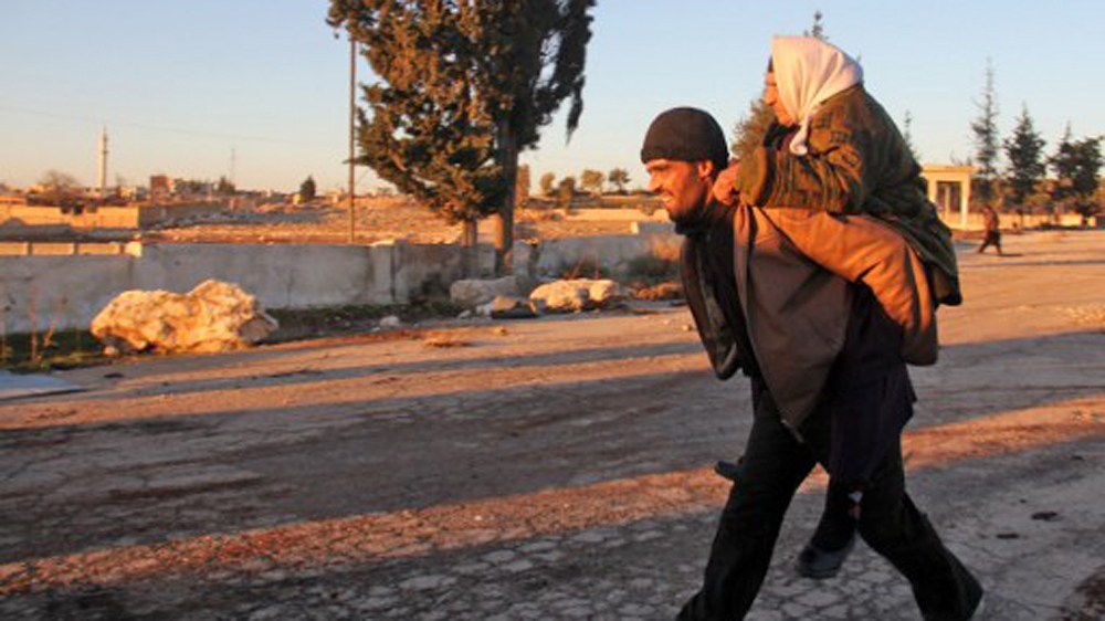 People evacuated from Aleppo arrived in the opposition-controlled Khan al-Aassal region [AFP]