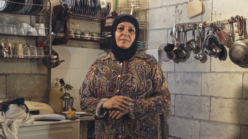 'We are trying to coexist and live alongside each other. We visit each other and our children play with each other' [Courtesy of ICRC/Brandon Tauszik/Al Jazeera]