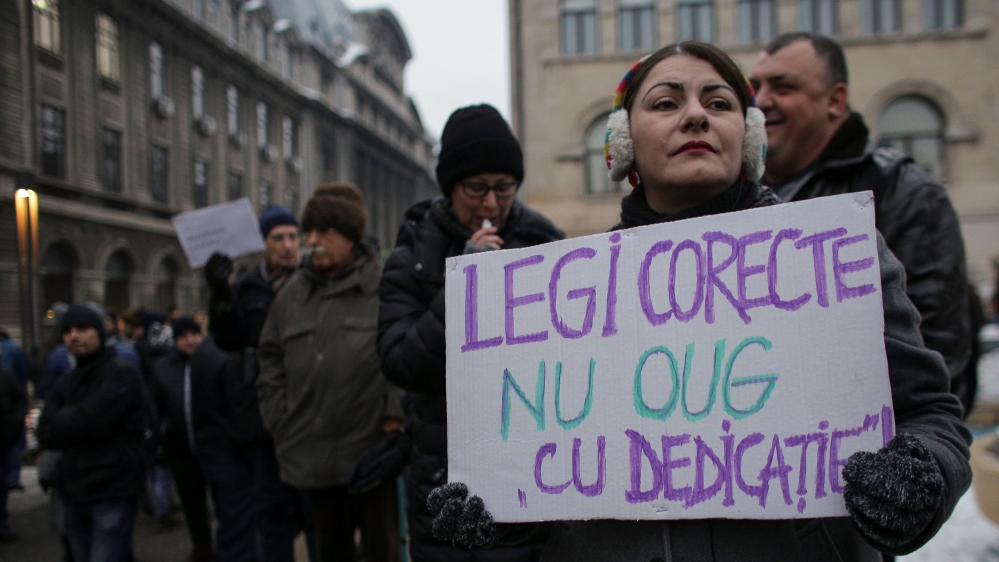 People take part in a demonstration to protest against government plans to reform some criminal laws through emergency decree [EPA]