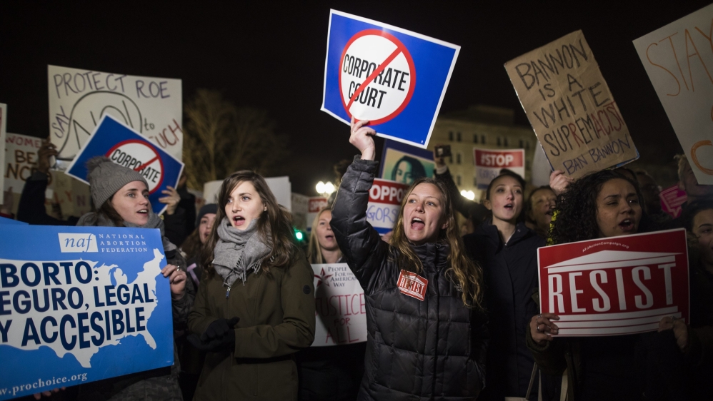 People gather outside the US Supreme Court in Washington, DC to protest Trump's nomination of Neil Gorsuch [EPA]