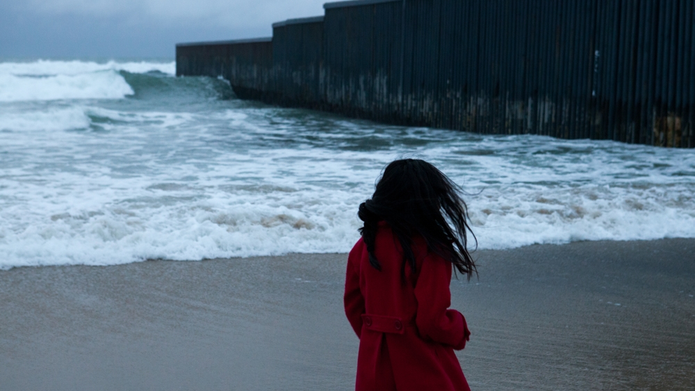 The US-Mexico wall as seen from Playas de Tijuana in Mexico  [ Jessica Chou/Al Jazeera] 
