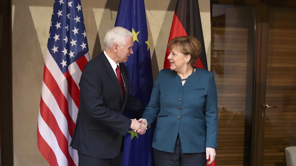 German Chancellor Merkel poses for a picture with U.S. Vice President Pence before their meeting at the 53rd Munich Security Conference in Munich