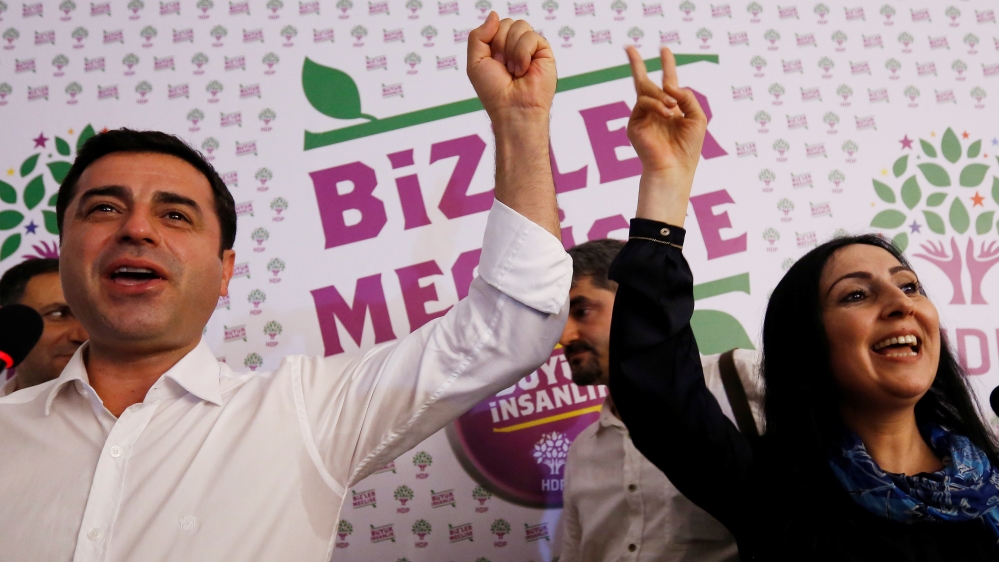 File photo of co-chairs of the pro-Kurdish HDP, Demirtas and Yuksekdag, celebrating election results during a news conference in Istanbul