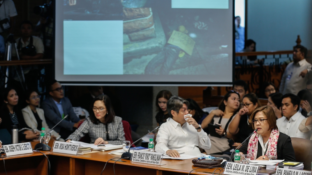  De Lima has branded President Duterte a 'sociopathic serial killer' because of his drug war policy that has left more than 7,000 people dead   [File: EPA]