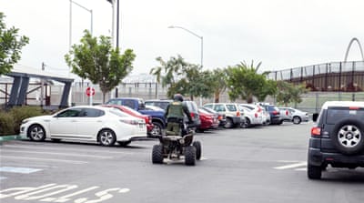 A Customs and Border Patrol officer patrols the US side of the border with Mexico  [Jessica Chou/Al Jazeera] 