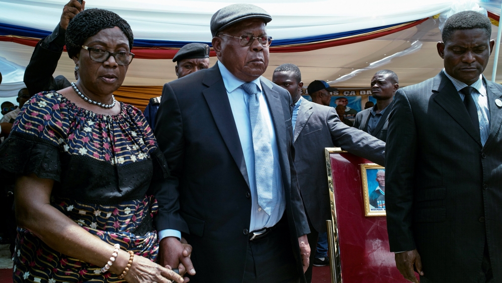 Congolese opposition leader Tshisekedi and his wife Marthe arrive to pay their last respects before a funeral service at the UDPS headquarters in Limete, Kinshasa