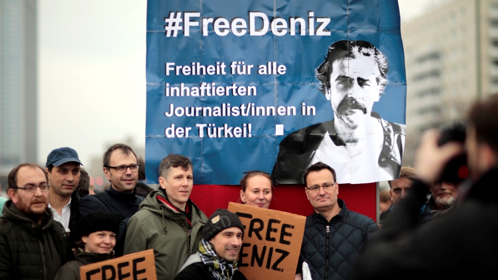Protestors demonstrate, calling for the freedom of German-Turkish journalist Deniz Yucel, in the streets of Berlin