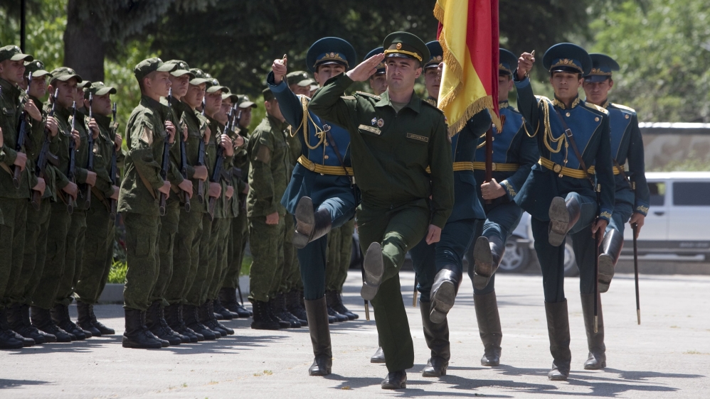 Servicemen of the military forces of South Ossetia march during an oath of allegiance ceremony in Tskhinvali