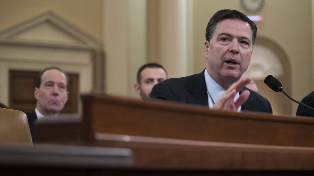 Comey testifies before the House Select Intelligence Committee in March [Shawn Thew/EPA]