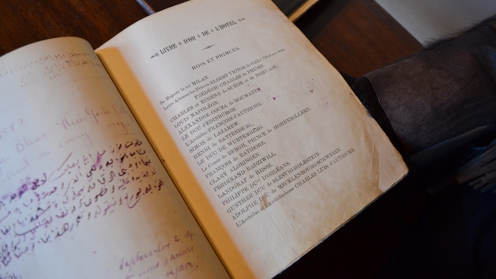 Guestbooks hold records of kings, queens, artists, writers and tourists who passed through the hotel [India Stoughton/Al Jazeera]