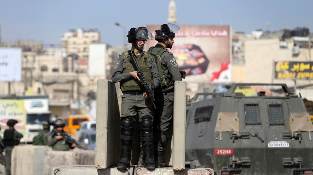 The Israeli army was kept off the 2015 blacklist after the US and Israeli governments threatened to withhold funding from certain UN programmes if Israeli forces were included [Mohamad Torokman/Reuters]