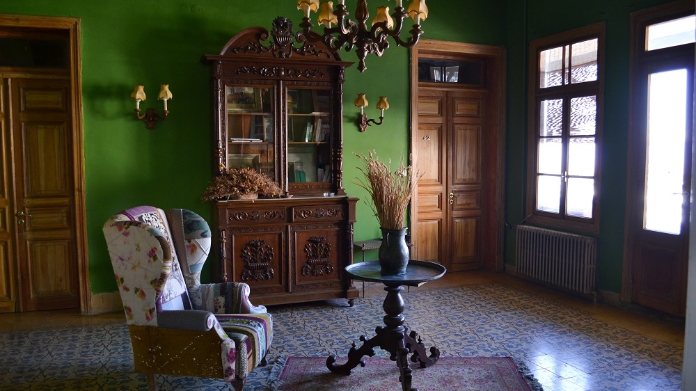 Palmyra Hotel's owners strive to preserve the hotel with its creaking beds, gurgling pipes and ancient furnishings   [India Stoughton/Al Jazeera]