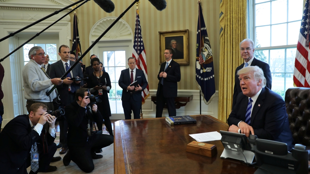 U.S. President Donald Trump talks to journalist at the Oval Office of the White House after the AHCA health care bill was pulled before a vote in Washington, U.S.