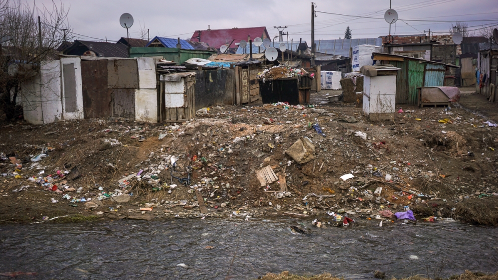 The river that flooded in 1998, destroying more than 170 homes in the slum and killing 52 people [Sorin Furcoi/Al Jazeera]
