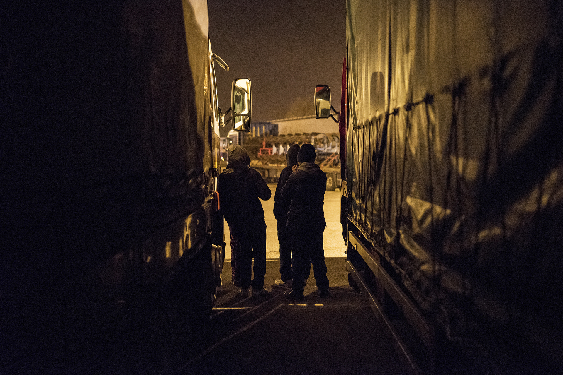 Young Eritreans and Oromo Ethiopians in Calais wait before attempting to sneak into trucks [Guillem Trius/Al Jazeera]