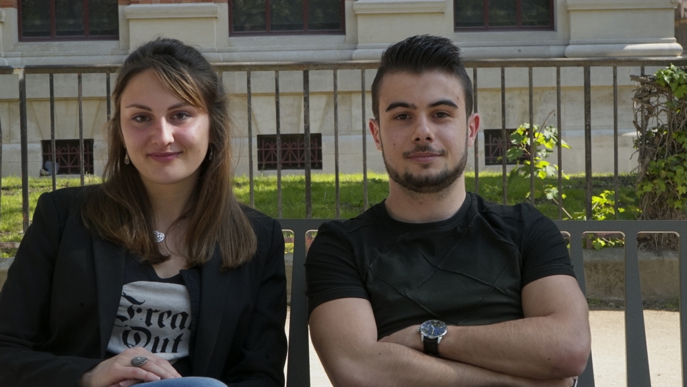 Luce, left, admires Melenchon while Julien is undecided between Macron and Melenchon [Shafik Mandhai/Al Jazeera]
