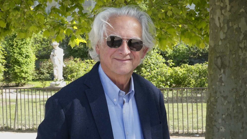 Patrice backs Fillon because 'he will reform the economy drastically' [Shafik Mandhai/Al Jazeera]