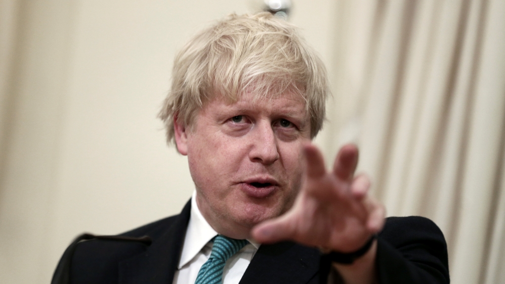 British Foreign Secretary Johnson answers a question during a joint press conference with Greek Foreign Minister Kotzias following their meeting at the Foreign Ministry in Athens