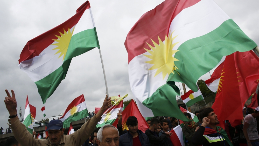 People carry Kurdistan flags during a May Day demonstration in Istanbul