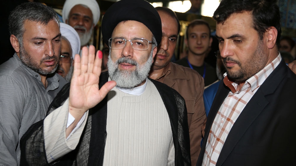 Raisi has tried to gain support by promising more financial support to the working class and poor [Reuters]