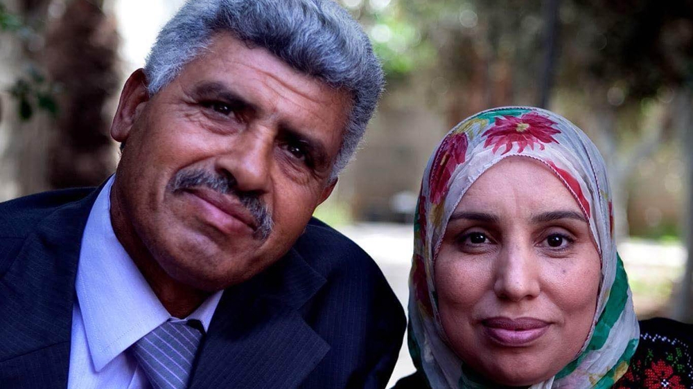 Former Palestinian hunger striker Ismail Abusalama with his wife [Courtesy of Shahd Abusalama/Al Jazeera]
