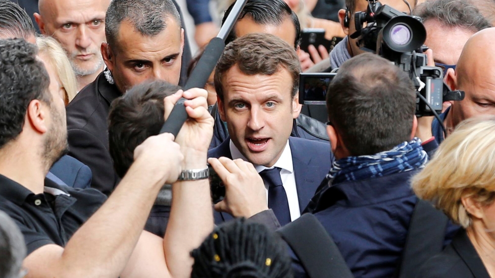 Emmanuel Macron, head of the political movement En Marche !, or Onwards !, and candidate for the 2017 presidential election, speaks with supporters during a campaign visit in Rodez