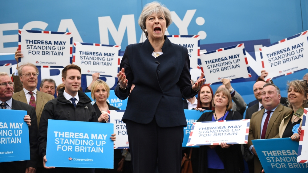 Britain''s PM May addresses supporters and members of the media at an airfield north of Newcastle