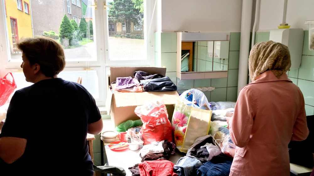 Inside the Clausnitz school where donations for refugees are stored and collected [Jacob Kushner/Al Jazeera]