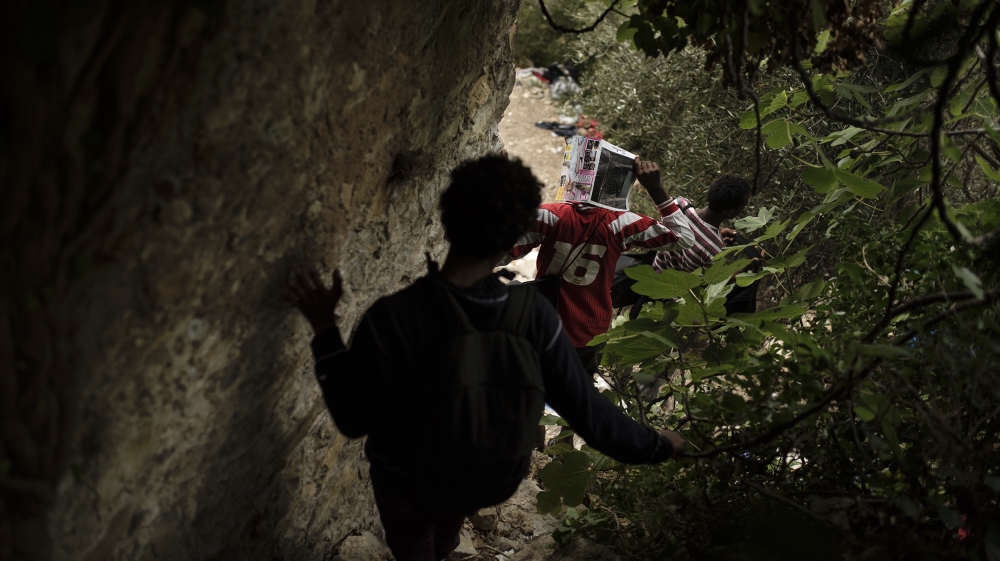 The walkway to the beginning of the Pass of Death is steep, uneven and overgrown [Maurizio Martorana/Al Jazeera]