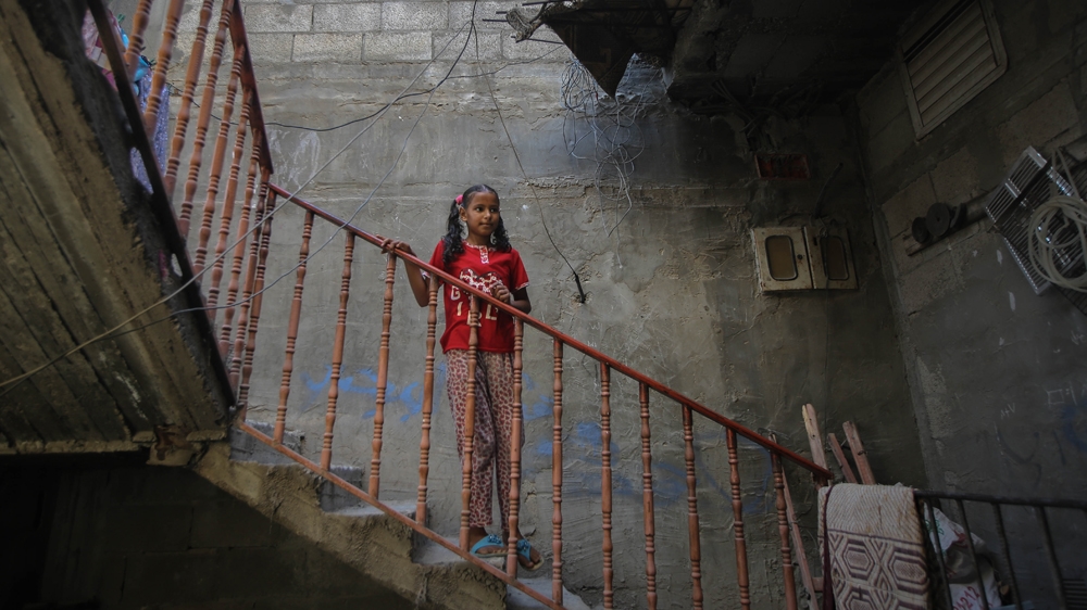 Malak lost her grandfather in the war when Israeli soldiers shot him dead [Ezz Zanoun/Al Jazeera]
