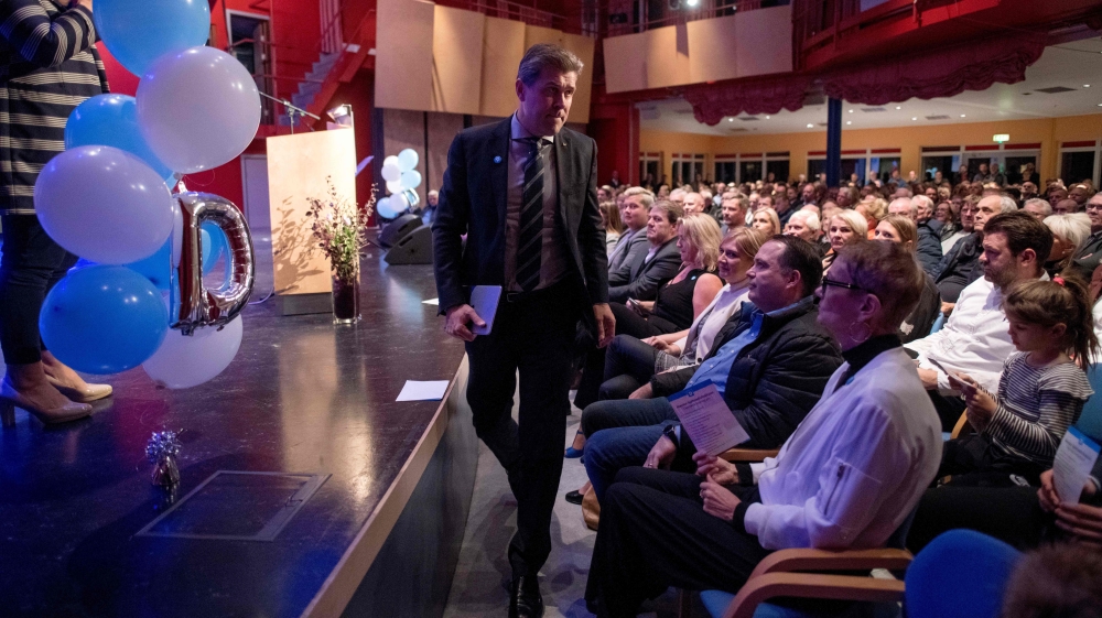 Iceland's Prime Minister and leader of the ruling conservative Independence Party, Bjarni Benediktsson, leaves after giving a speech during a campaign meeting on October 24 [Halldor Kolbeins/AFP/Getty Images]