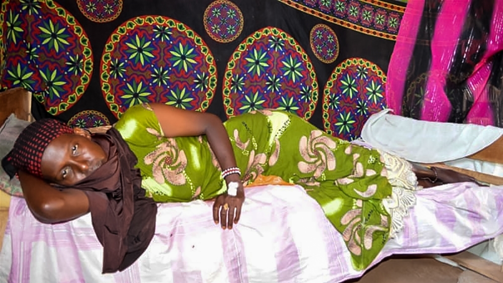 Amina Adan is unable to receive healthcare and struggles to feed her children [Mary Mwendwa/Al Jazeera]