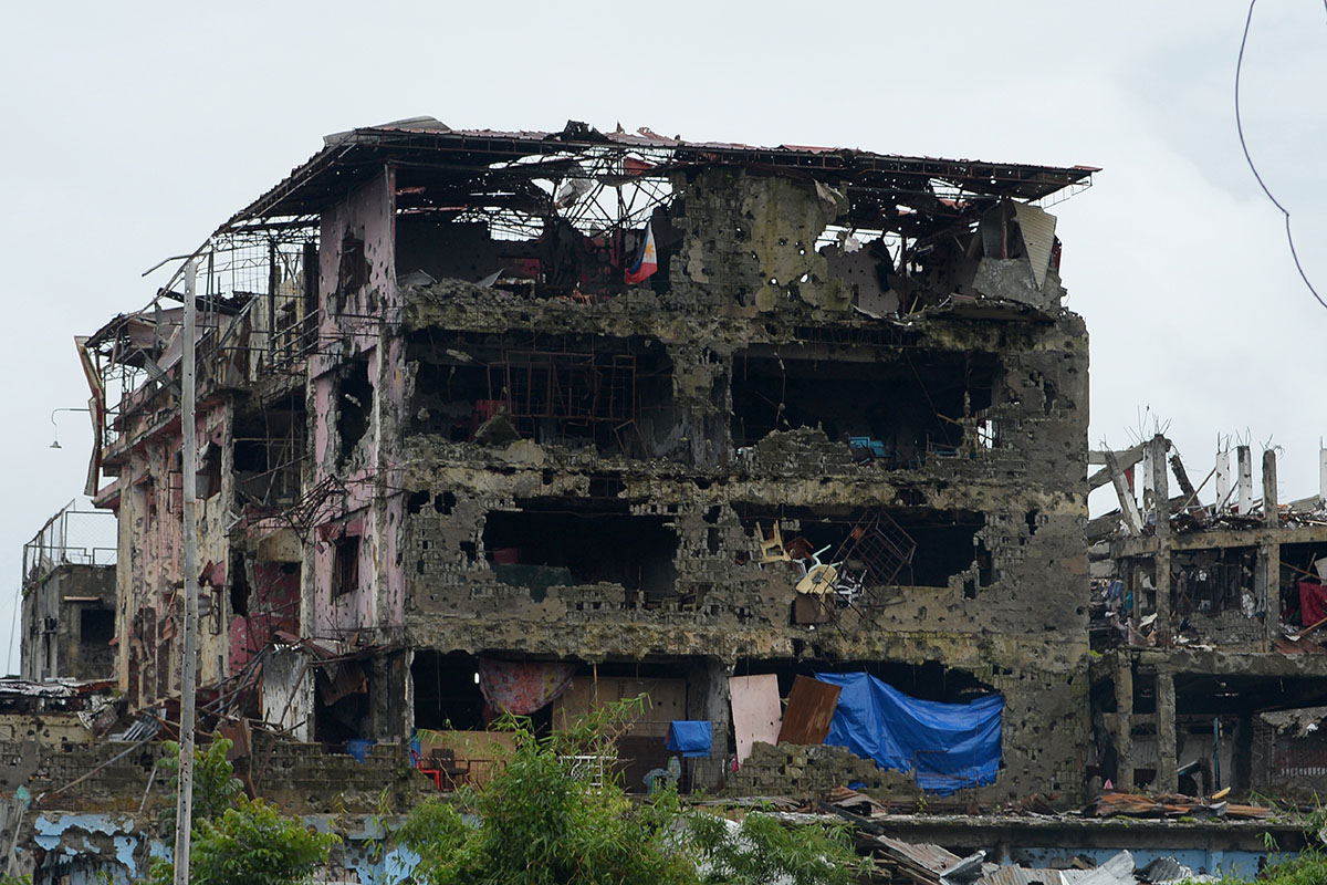 Bombed-out buildings are seen inside the battle area of Bangolo district in Marawi on October 17, 2017. Philippine President Rodrigo Duterte on October 17 symbolically declared a southern city ''libera