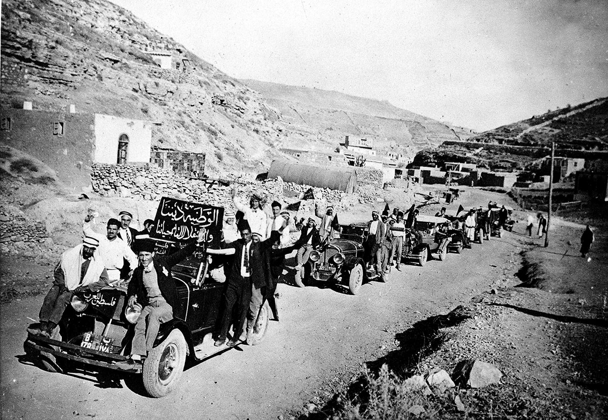 Arab protestors travelling to Amman for a demonstration against the Balfour Declaration of 1917, promising the creation of a Jewish state in Palestine, Jordan, 1936. The banners read: ''Palestine for t