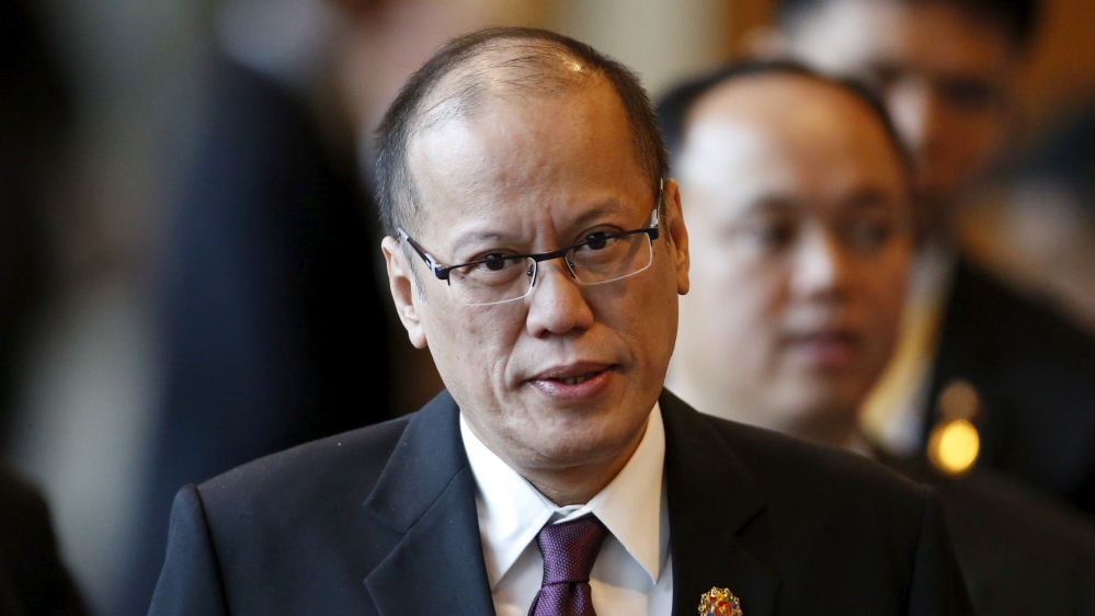 FILE PHOTO Philippine President Aquino arrives at a session of the ASEAN Summit in Kuala Lumpur