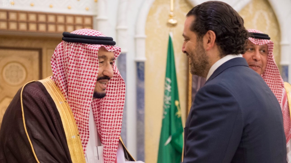 Saudi Arabia''s King Salman bin Abdulaziz Al Saud shakes hands with former Lebanese Prime Minister Saad al-Hariri during their meeting in Riyadh