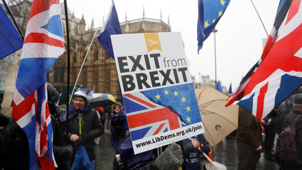 Anti Brexit protesters demonstrate outside the Houses of Parliament in London