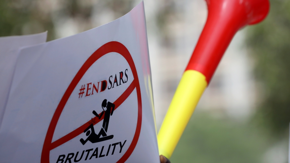 A banner with #ENDSARS is seen displayed during a rally to stop the Special Anti-Robbery Squad (SARS), in Abuja