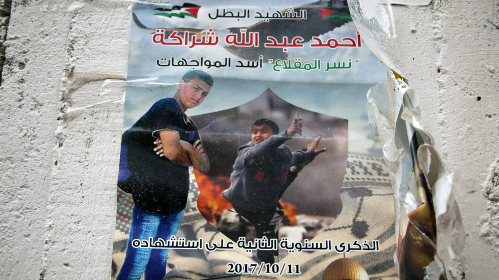 A poster of Ahmad Sharaka, 14, who was killed at a demonstration near the illegal West Bank settlement of Beit El in October 2015 [Ylenia Gostoli/Al Jazeera]