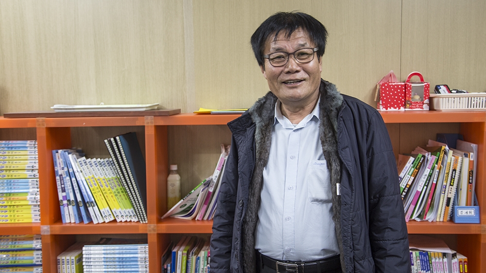 Kim Yong-hwa doubts humanitarian aid will reach the North Korean people [Faras Ghani/Al Jazeera]