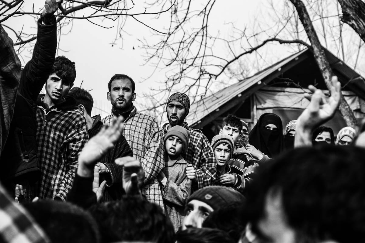 Children chanting anti-India slogans in Aripal Tral of Pulwama district, 43 km south of Srinagar city, the summer capital of Indian-controlled Kashmir, during a funeral of militant.