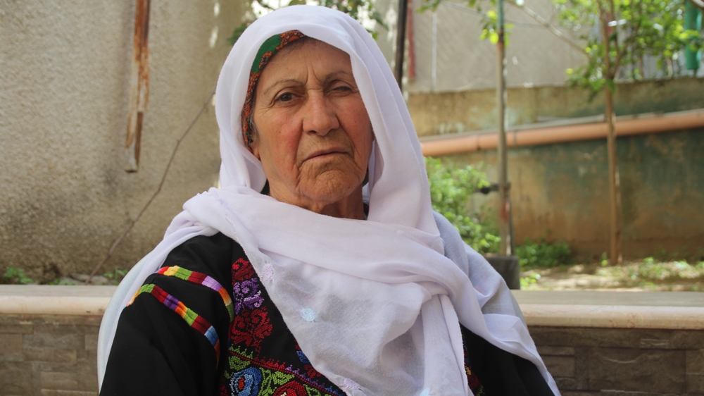 Amena Sanqar was 17 when she and her family were forced to flee their village of Beit Nabala [Shatha Hammad/Al Jazeera]