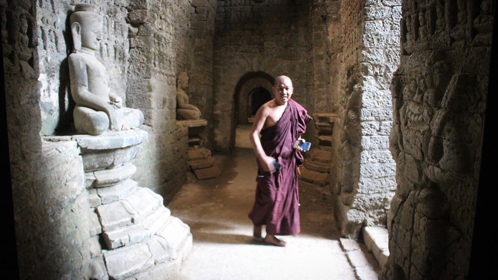 
Kyaw Hla Maung believes that learning about the history of different ethnic and religious groups in the state is important to rebuild peace, especially with the Rohingya [Libby Hogan/Al Jazeera]
