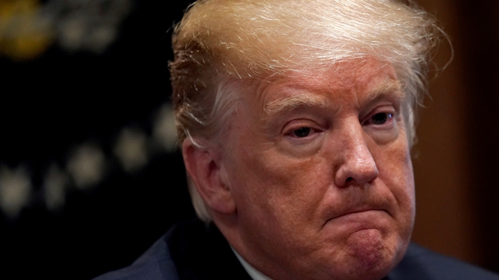 Iran Trump jeopardy Reuters